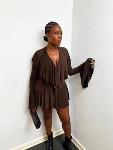 Deep brown V-neck dress with layered ruffles and dramatic flared sleeves in a slim fit