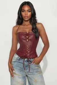 Detail of burgundy PU leather corset top with metal eyelets and lace-up front design