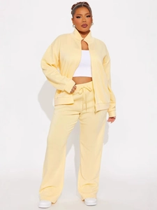 Women's autumn pale yellow velvet tracksuit with zip-up jacket and wide-leg drawstring pants