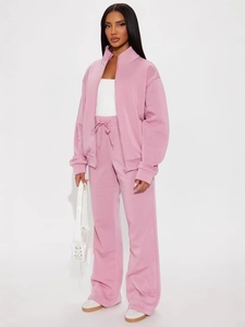 Pink women's two-piece tracksuit with zip-up stand collar jacket and drawstring pants