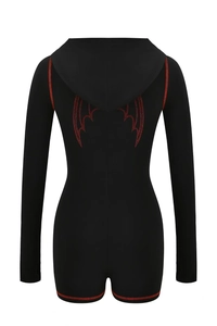 Detail view of the black hooded romper featuring red wings pattern and contrast stitching