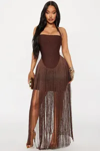 Detail of shimmering coffee brown fringe dress with neck halter and metallic finish texture