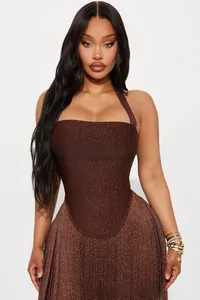 Detail of a brown halter corset top with metallic shimmer and fishbone support structure