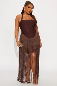 Detail of metallic coffee halter dress showing fringe texture and shimmering fabric