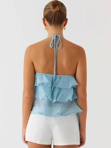 Top a fascia azzurro con volant a strati e schiena scoperta elegante per donna