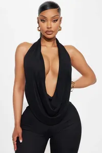 Close-up of black halter neck with deep V-neckline on sexy slim fit backless jumpsuit