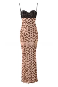 Detail of delicate black lace neckline on a leopard print maxi dress with slim straps
