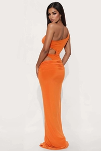 Detailed view of the hollowed waist and sleek cutout on this orange bodycon dress