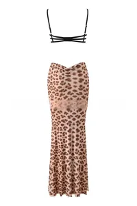 Detailed view of leopard print maxi skirt and black multi-strap camisole top two-piece set
