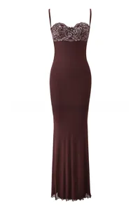 Detail of burgundy lace bodice with floral embroidery on the long bodycon dress