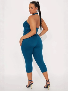 Women's teal halter neck backless top with slim fit capri pants two-piece set