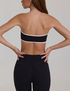 Detailed back view of a black tube top sports set with white trim and elastic leggings