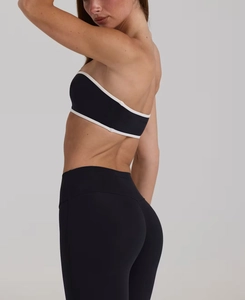 Detail view of the seamless high-waist fit and contrast binding on sports set