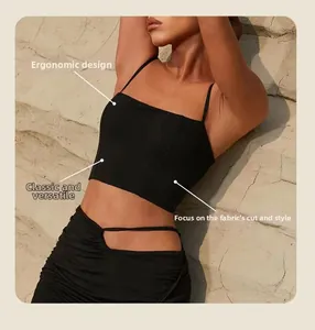 Close-up of black crop camisole with ergonomic built-in bra and thin straps
