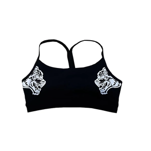 Detail of black sports bra with wolf head prints and racerback thin straps on white background