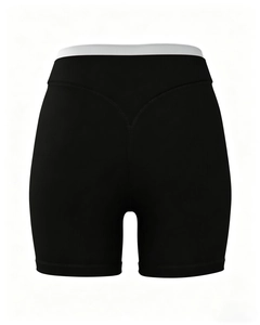 Nahaufnahme der schwarzen High-Waist-Yogahose mit weißem Bund und V-Naht für Push-up-Effekt