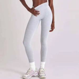 Close-up of V-shaped high waistband and marl grey texture on stretch yoga leggings