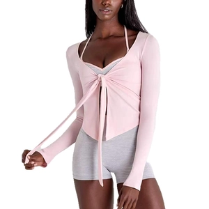 Gilet de yoga slim fit avec lien à nouer et tissu rose clair à séchage rapide pour femme