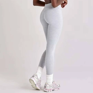 Detailed back view of light gray high-waisted yoga leggings with butt-lifting seams