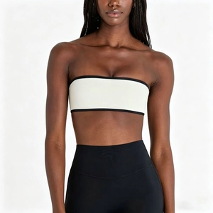 Minimalist white strapless sports bandeau top with black contrast piping for fitness