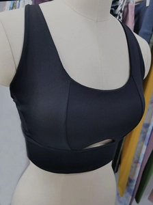 Detail of black shockproof sports bra featuring hollow-out design and high elastic fabric