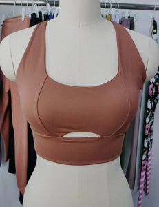 Macro detail of high-elastic sports bra with cutout design and supportive seams