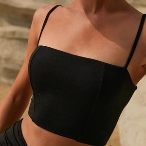 Slim fit black yoga tank top with thin straps and square neckline for outdoor sports