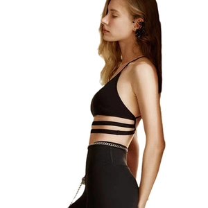 Reggiseno sportivo yoga nero da donna con vita incrociata e design a girocollo