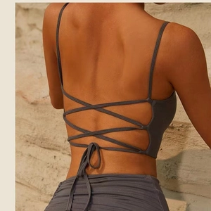 Deep grey yoga set featuring multi-cross back straps and a decorative bow tie design