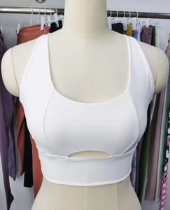 White high-impact sports bra with a U-neckline and half-moon cutout detail on the front