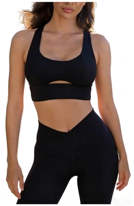 Detail of high-waist yoga set featuring cross V-waistband and cutout sports bra design