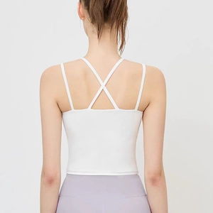Débardeur de sport blanc avec fines bretelles croisées et dos nu pour yoga et fitness