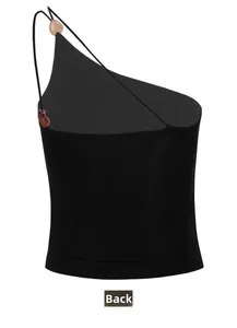 Macro detail of black yoga top back view with slim straps and decorative beads accent