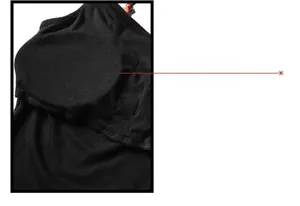 Detail of internal built-in chest pads on black yoga vest for shape and comfort