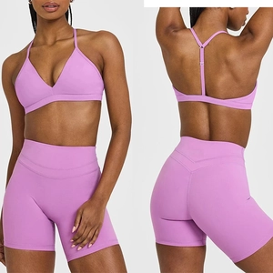 Lavender high waist yoga set featuring V-neck sports bra and lifting shorts shown from two angles