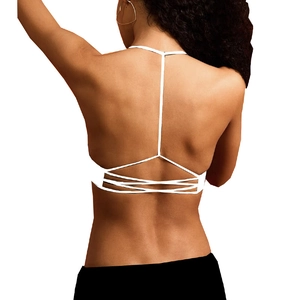 Brassière de yoga blanche avec fines bretelles et dos croisé au design minimaliste