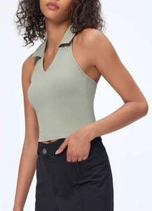Detailed side view of sage green polo neck yoga tank top with elegant deep V collar
