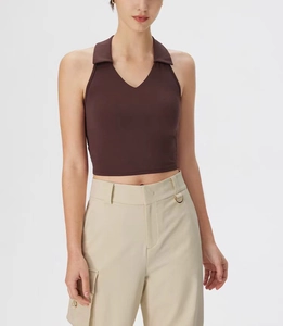 Detail of deep V-neck Polo collar yoga tank top in chocolate brown with halter design