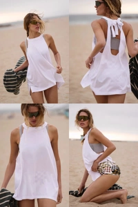 Multiple views of a white backless yoga cover-up with stylish ribbon tie detail