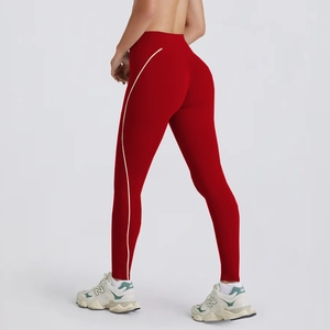 Rear view of high-waist red yoga leggings with white side stripes and lifting effect