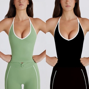 Women's halter yoga set with V-neck sports bra and high waist leggings in contrast colors