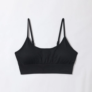 Detail of black seamless sports bra with adjustable straps and wide ribbed supportive band