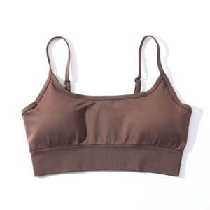 Detail of coffee brown sports bra with adjustable straps and ribbed hem for yoga