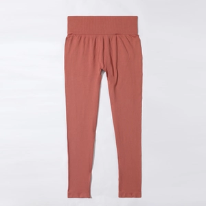 Detail of brick red high waist seamless yoga leggings with ribbed waistband