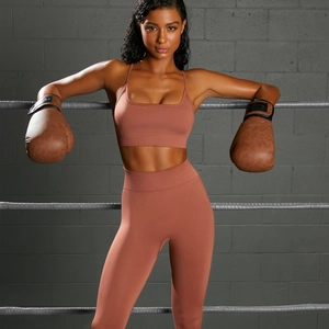 Women's seamless brick red yoga set including sports bra and high-waist leggings