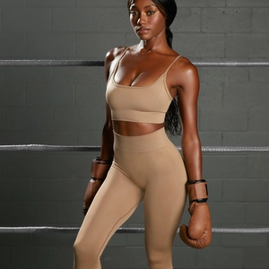 Seamless yoga set featuring a U-neck sports bra and high-waisted leggings in dark beige