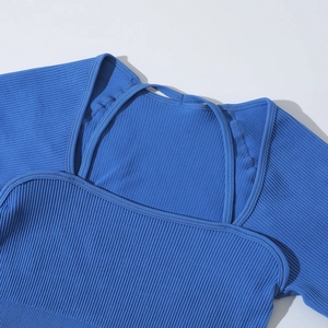 Seamless ribbed knit yoga top in royal blue featuring square neck and cross straps