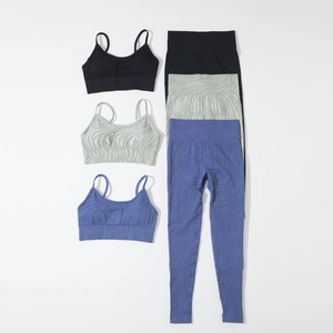 Detailed view of seamless yoga sets with animal and wave patterns in three colors