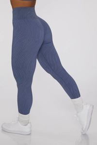 Detail view of high-waist seamless yoga leggings with blue wave pattern and contouring fit