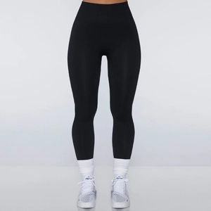 Seamless black high-waisted yoga leggings for women made of stretchy knitted fabric